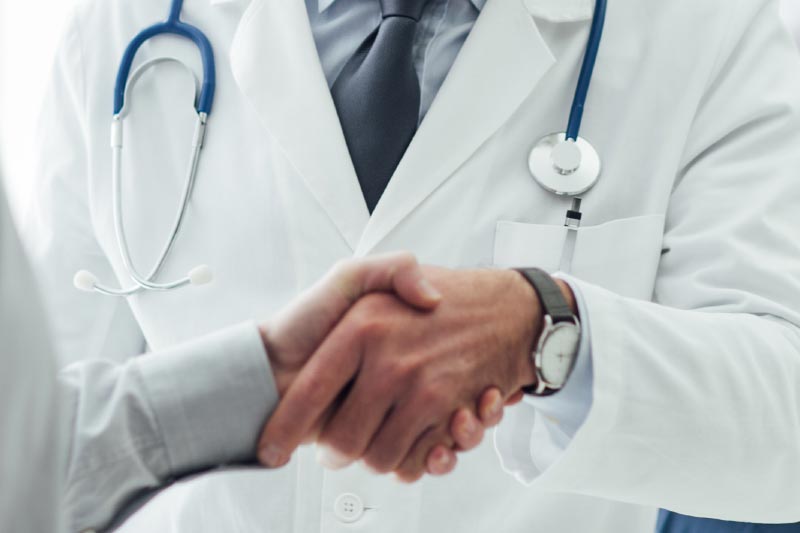 doctor shaking hand